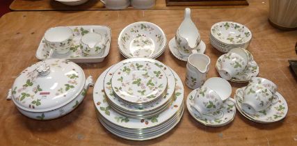 A Wedgwood tea & dinner service in the Wild Strawberry pattern R4406 having printed marks verso,