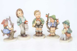 A collection of five Goebel's pottery figures of children, the largest h.12cm
