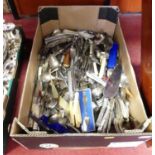 A collection of silver plated flat ware to include table forks, table knives, serving spoons,