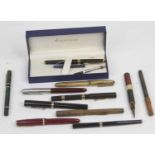 A collection of fountain pens, to include Waterman and Parker