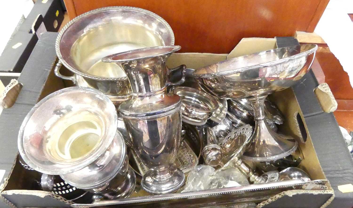 A collection of silver plated items to include a wine cooler of twin handled campagna shape,