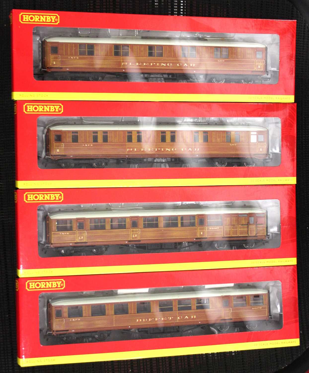 Four Hornby teak corridor coaches: two R4174B 1st class sleeper no.1317; one brake R4170D no.24067