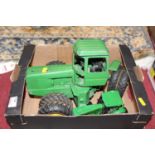 An ERTL 1/16 scale articulated 4WD John Deere tractor, together with one other