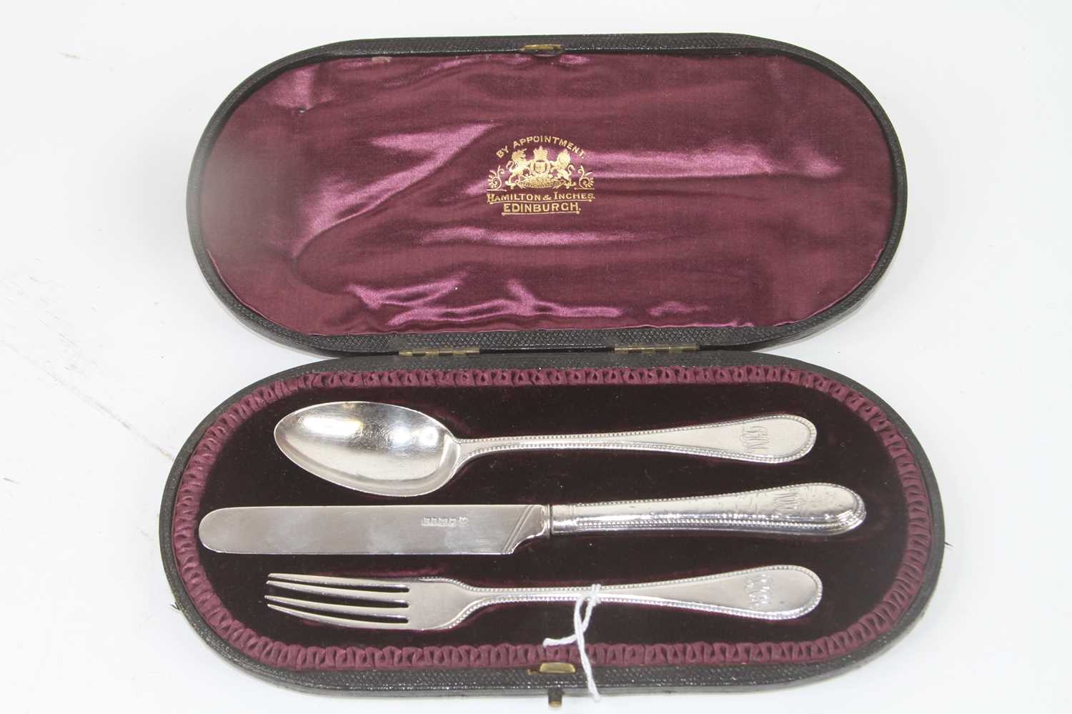 A Victorian silver christening set, in the Old English bead pattern, in fitted leather case