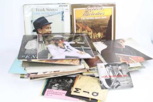 A collection of vintage LPs and singles, to include Frank Sinatra