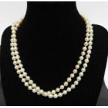 A cultured and knotted pearl single string necklace, with 9ct gold elliptical clasp, pearl diameters
