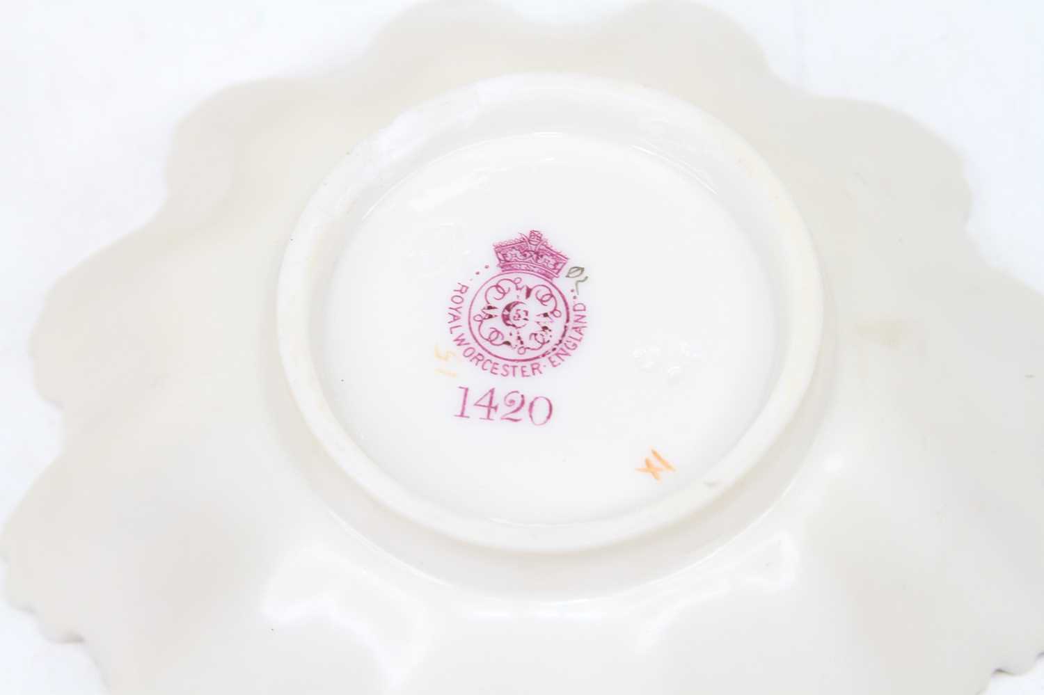 A pair of Royal Worcester blush ivory 1334 pattern coffee cans and saucers, decorated with - Image 2 of 2