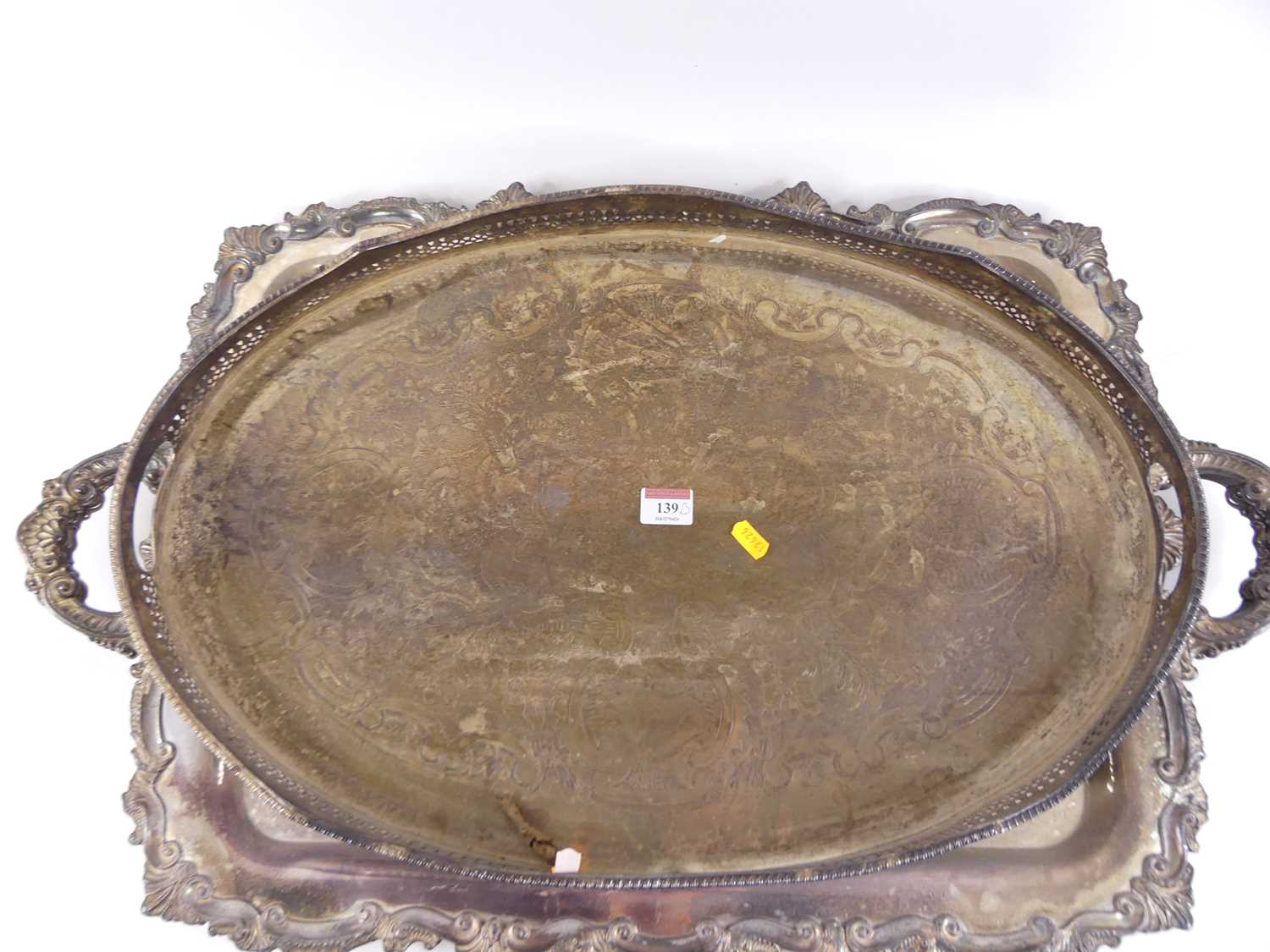 A pair of silver plated serving trays, having twin handles and scrolled borders, w.76cm; together - Image 2 of 3