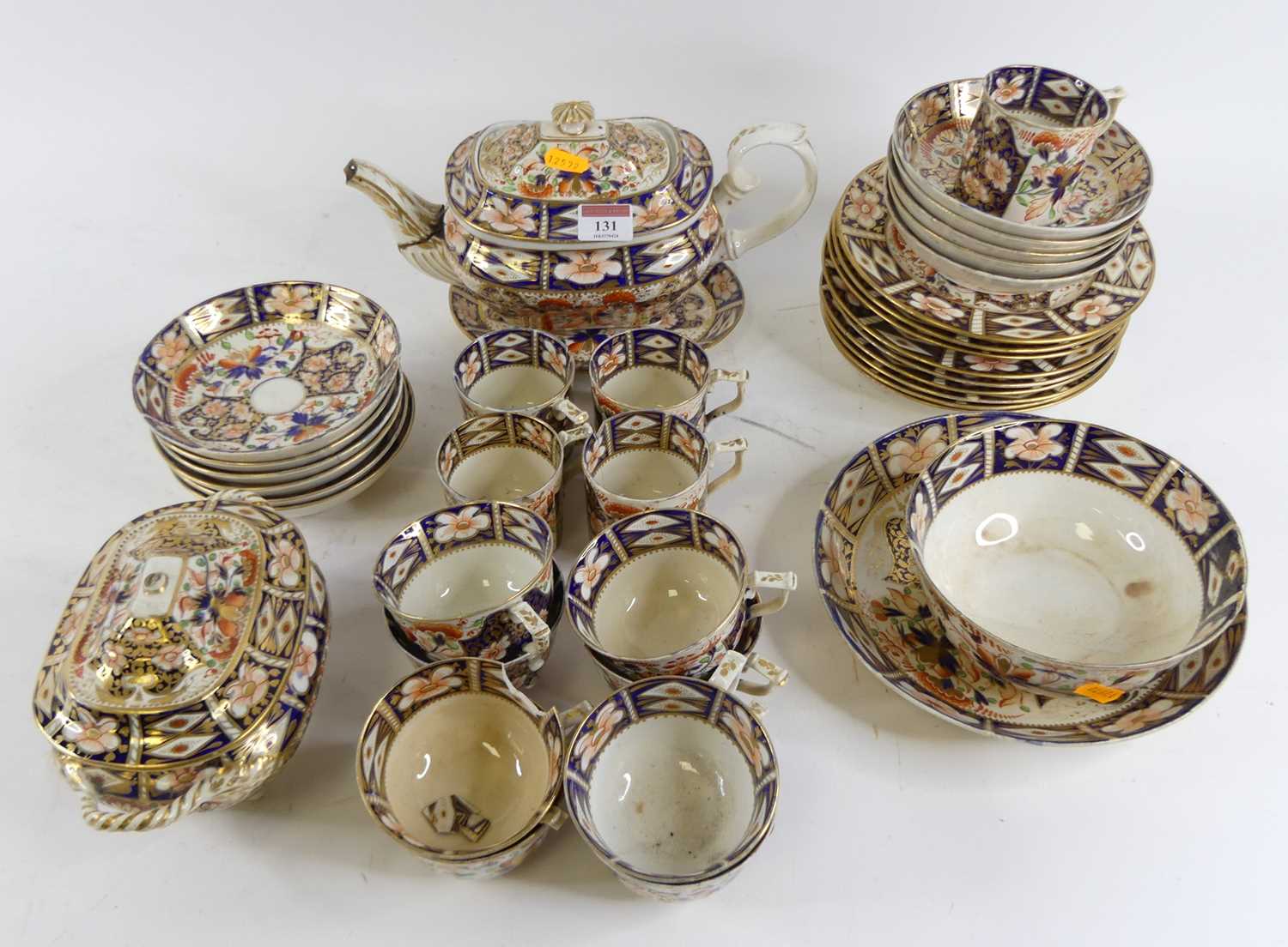 A 19th century Royal Crown Derby imari part tea and coffee service (a/f)