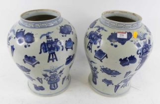 A pair of Chinese blue & white porcelain vases, each of baluster form, decorated with antiques,