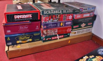 A large quantity of various table board games to include Jenga, Pass The Bomb etc