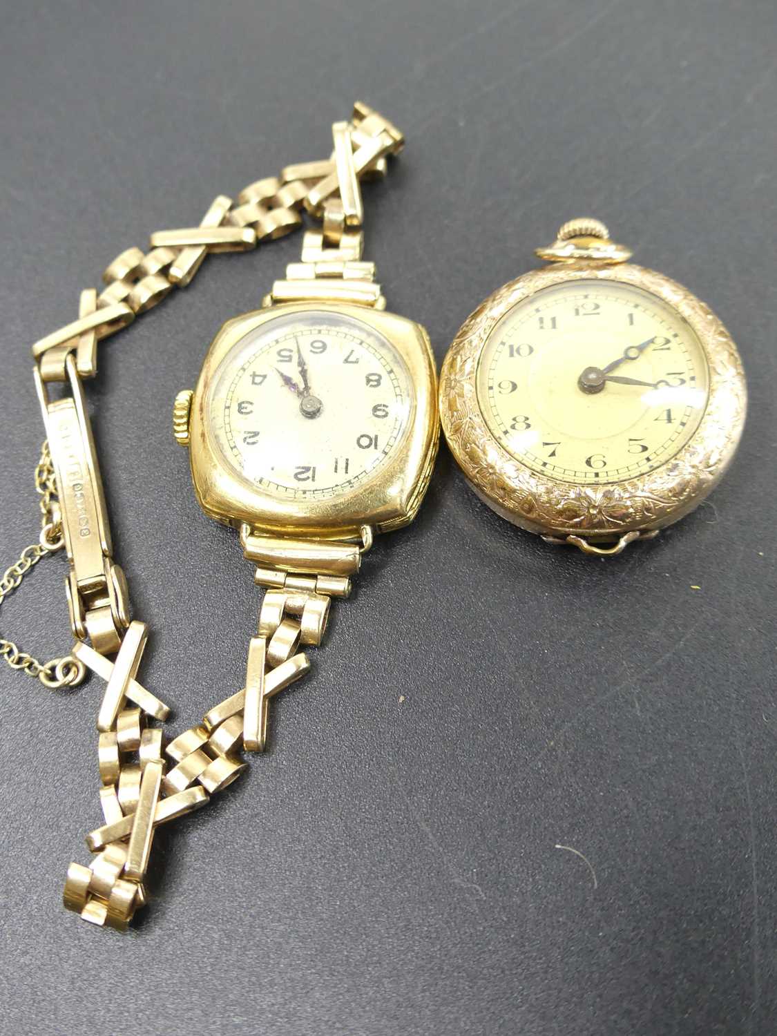 A lady's vintage 18ct gold cased manual wind wristwatch, on 9ct gold bracelet, with safety chain, - Image 3 of 3