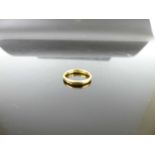 A 22ct gold wedding band, sponsor F&G, 3.4g, size J