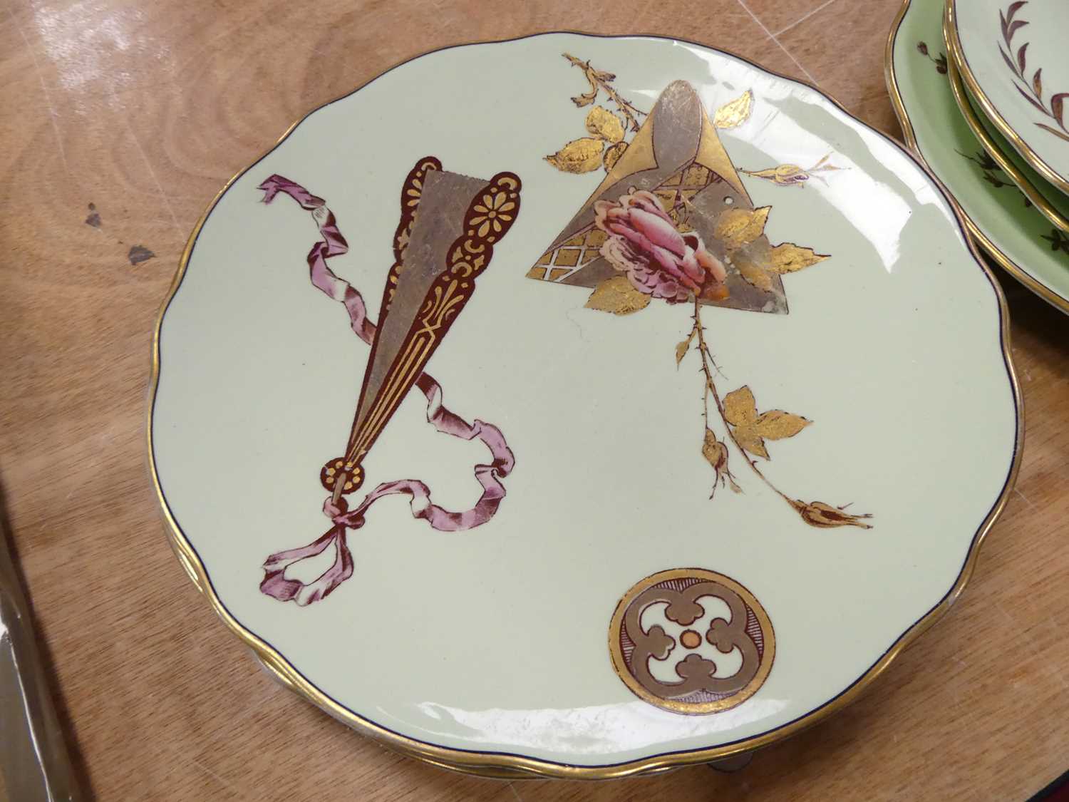 A Victorian green glazed six-place dessert service, gilt decorated with antiques and flowers, dia. - Image 7 of 7