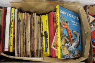 A box of mostly Wild West related annuals, to include Davy Crockett Western No.38, Zane Grace etc