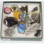 A collection of costume jewellery, to include a Scottish polished hardstone brooch