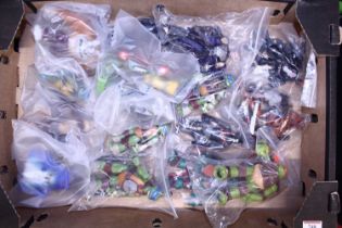 Two trays containing Teenage Mutant Ninja Turtles, related figures, and others