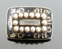A Victorian yellow metal seed pearl set mourning brooch, unmarked but tests as approx 18ct gold (