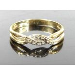 A yellow metal and cz set band ring, stamped 585 and tests as approx 14ct gold, 2.1g, size P/O