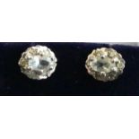 A cased pair of 9ct gold, blue topaz and white stone set ear studs, 1.3g, 8 x 7mm, in fitted box