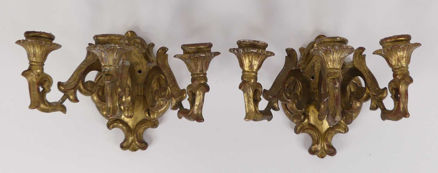 A pair of carved gilt wood three branch wall sconces, each height 19cm Probably early 20th - Image 2 of 4