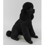 A large Leonardo Collection resin figure of a Poodle in seated pose, height 40cm