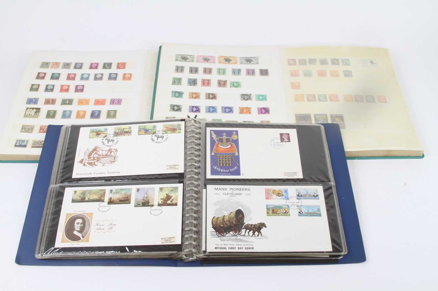 A collection of stamp albums and contents