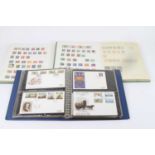 A collection of stamp albums and contents