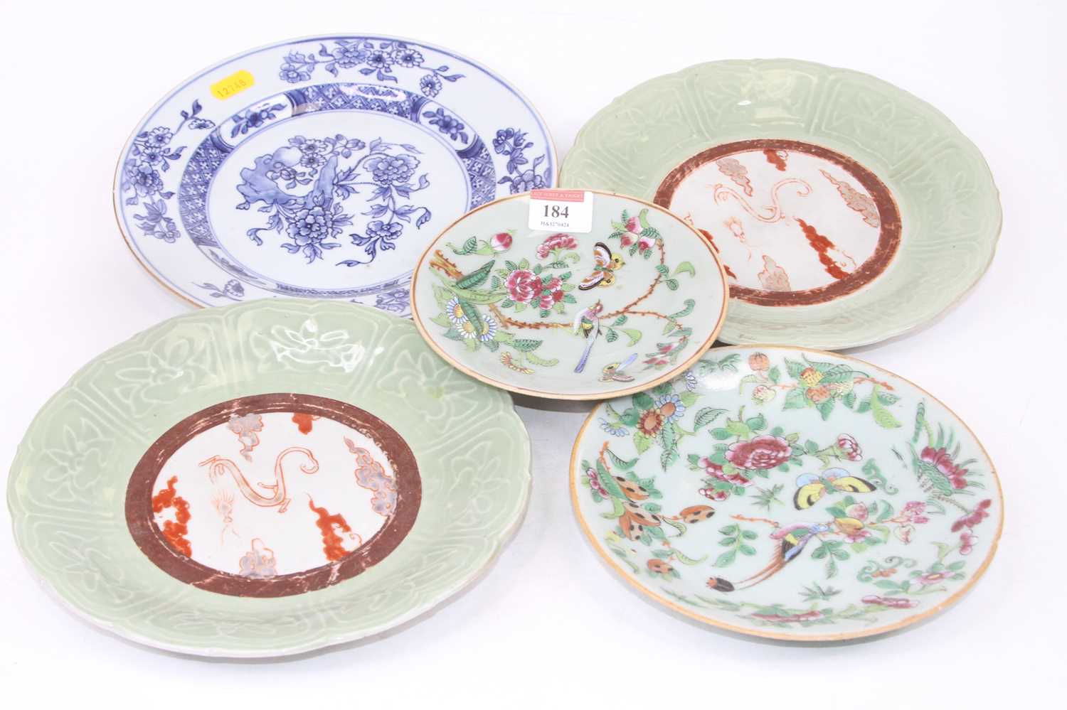 A collection of five 18th century and later Chinese plates, to include celadon, blue and white and
