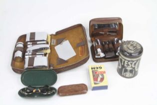 A collection of vintage travelling dressing sets etc