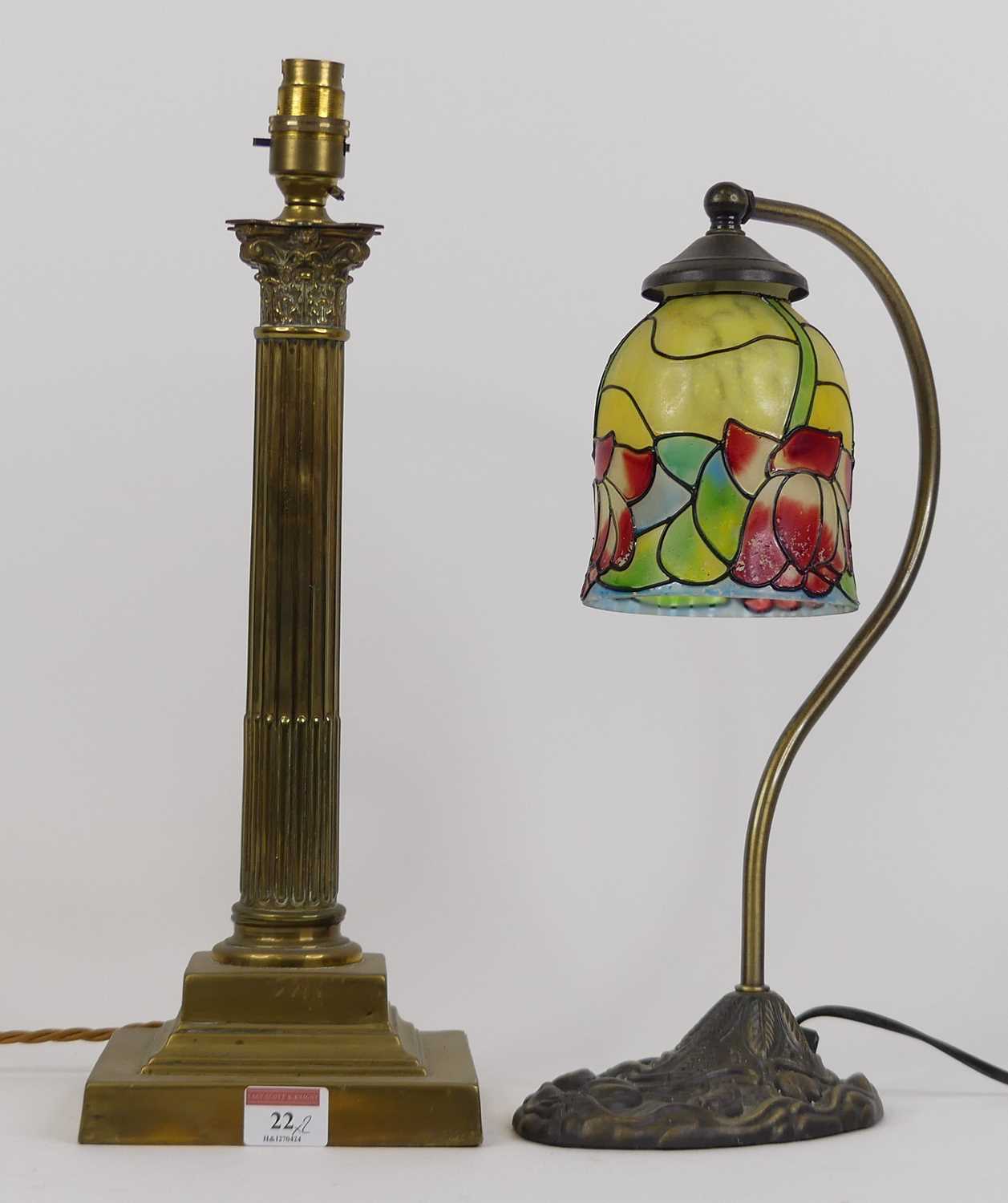 A brass table lamp, in the form of a Corinthian column, height 42cm, together with another brass