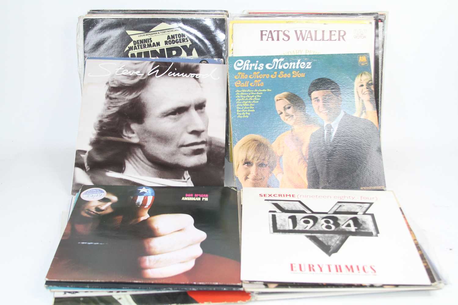 A collection of vintage LPs, to include The Secret Policeman's Ball and David Essex
