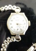 A lady's vintage Rotary 9ct gold cased manual wind wristwatch, on 9ct gold gatelink bracelet,