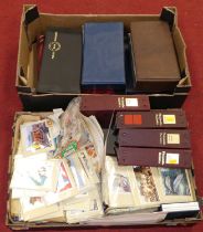 Two boxes containing PHQ cards and first day covers