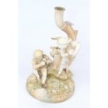 A Royal Worcester figure group of children, h.28cm Formally a table candelabra.Restored.