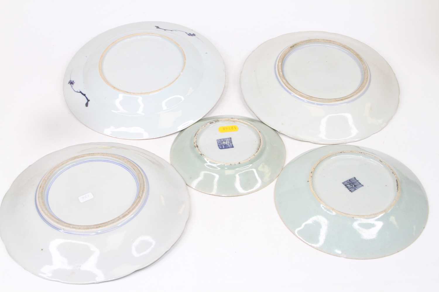 A collection of five 18th century and later Chinese plates, to include celadon, blue and white and - Image 2 of 2