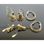A pair of 9ct gold and oval cut garnet set ear pendants, on shepherd's crook fittings; together with