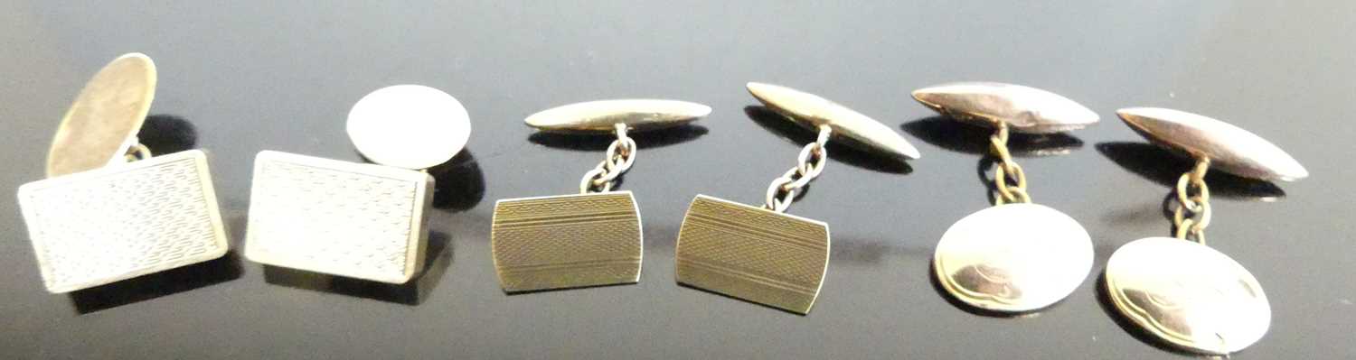A pair of gent's 9ct gold engine turned cufflinks; together with another pair, gross weight 13.7g;
