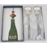 A Chinese white metal spoon and chopstick set, stamped 800, 6ozt, boxed