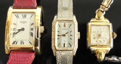 A lady's Rotary quartz tank watch, in case; together with two vintage lady's gilt metal cased manual