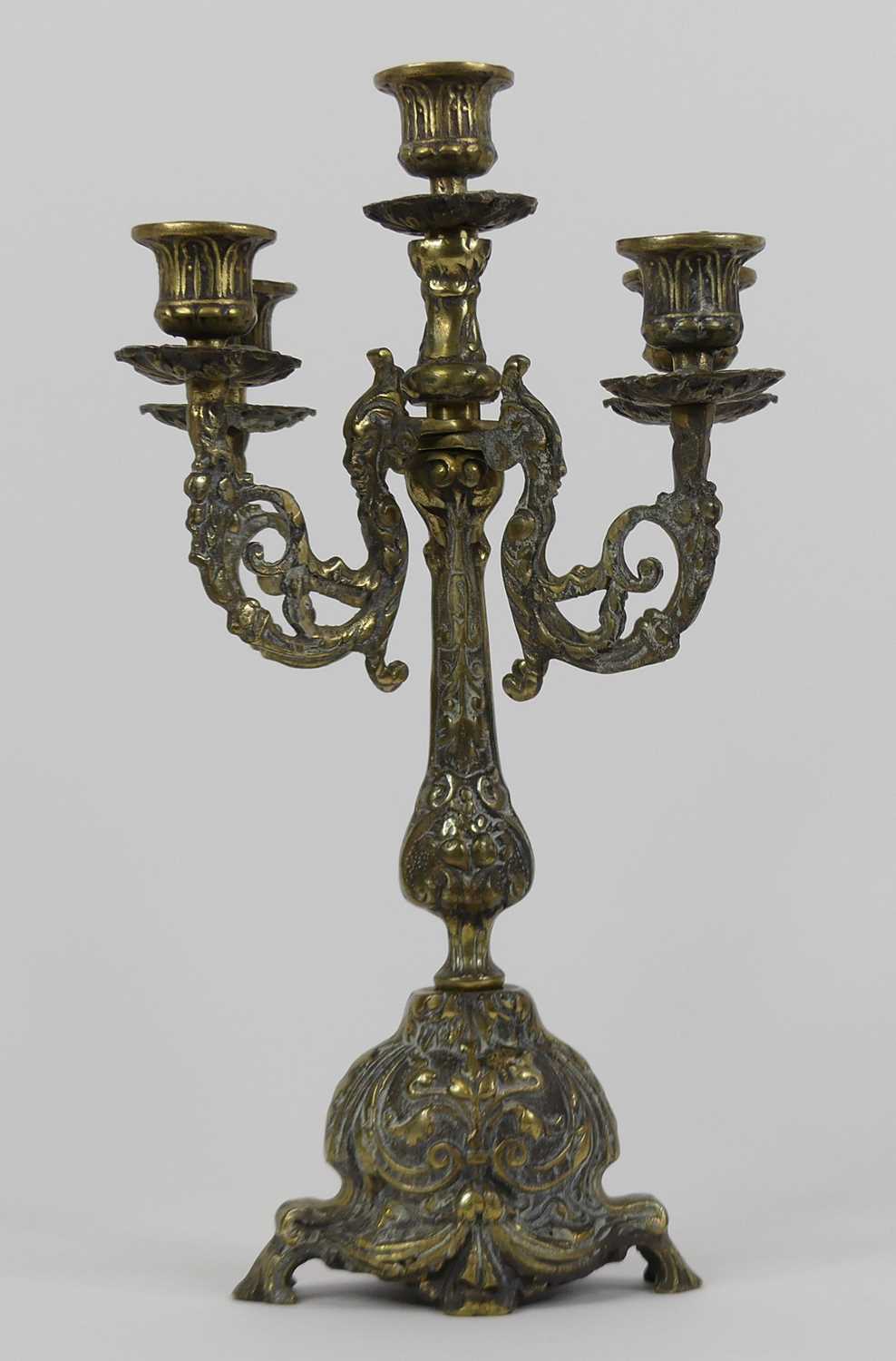 A brass five branch table candelabra, height 35cm