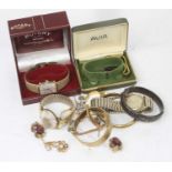 A collection of costume jewellery to include a Rotary quartz wristwatch, bangle, necklaces, etc