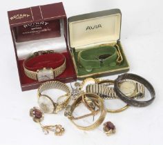 A collection of costume jewellery to include a Rotary quartz wristwatch, bangle, necklaces, etc