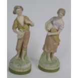 A pair of Royal Dux figures, each h.21.5cm