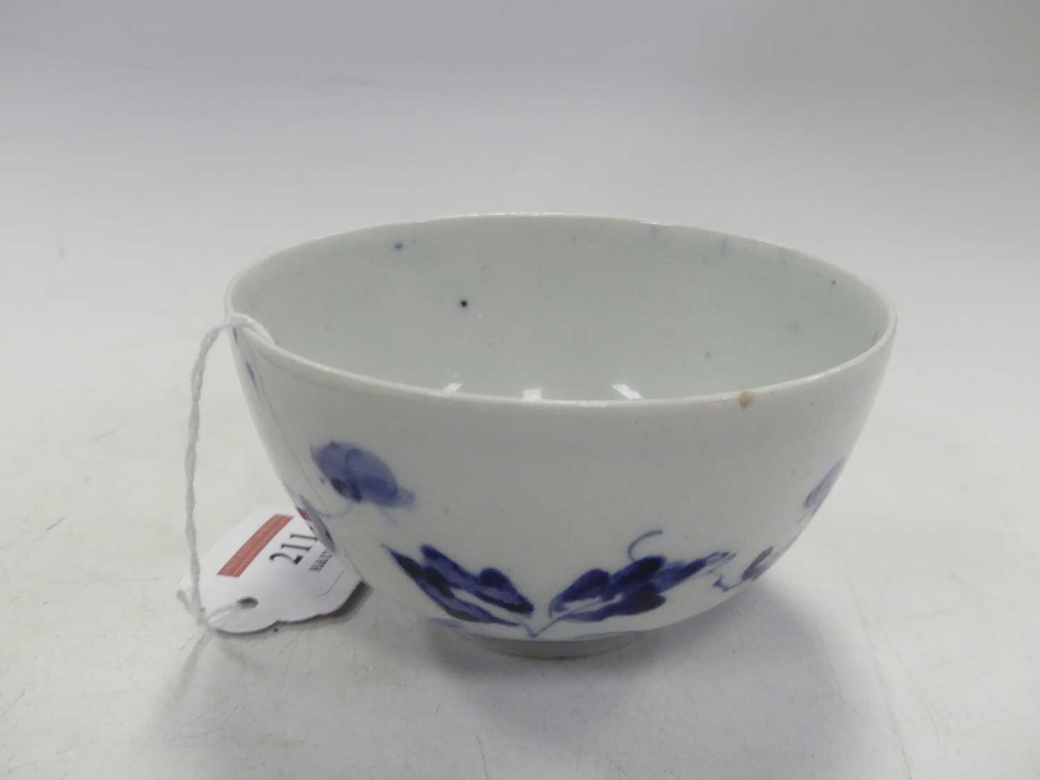 A Chinese blue and white porcelain bowl, decorated with flowers, six character mark to the base, - Image 4 of 7