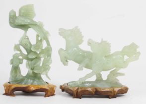 Two Chinese green carved polished hardstone animal figures, the largest h.23cm (2)