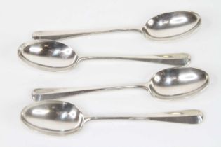A set of four George V silver teaspoons in the Hanovarian Rat-tail pattern, maker Goldsmiths &