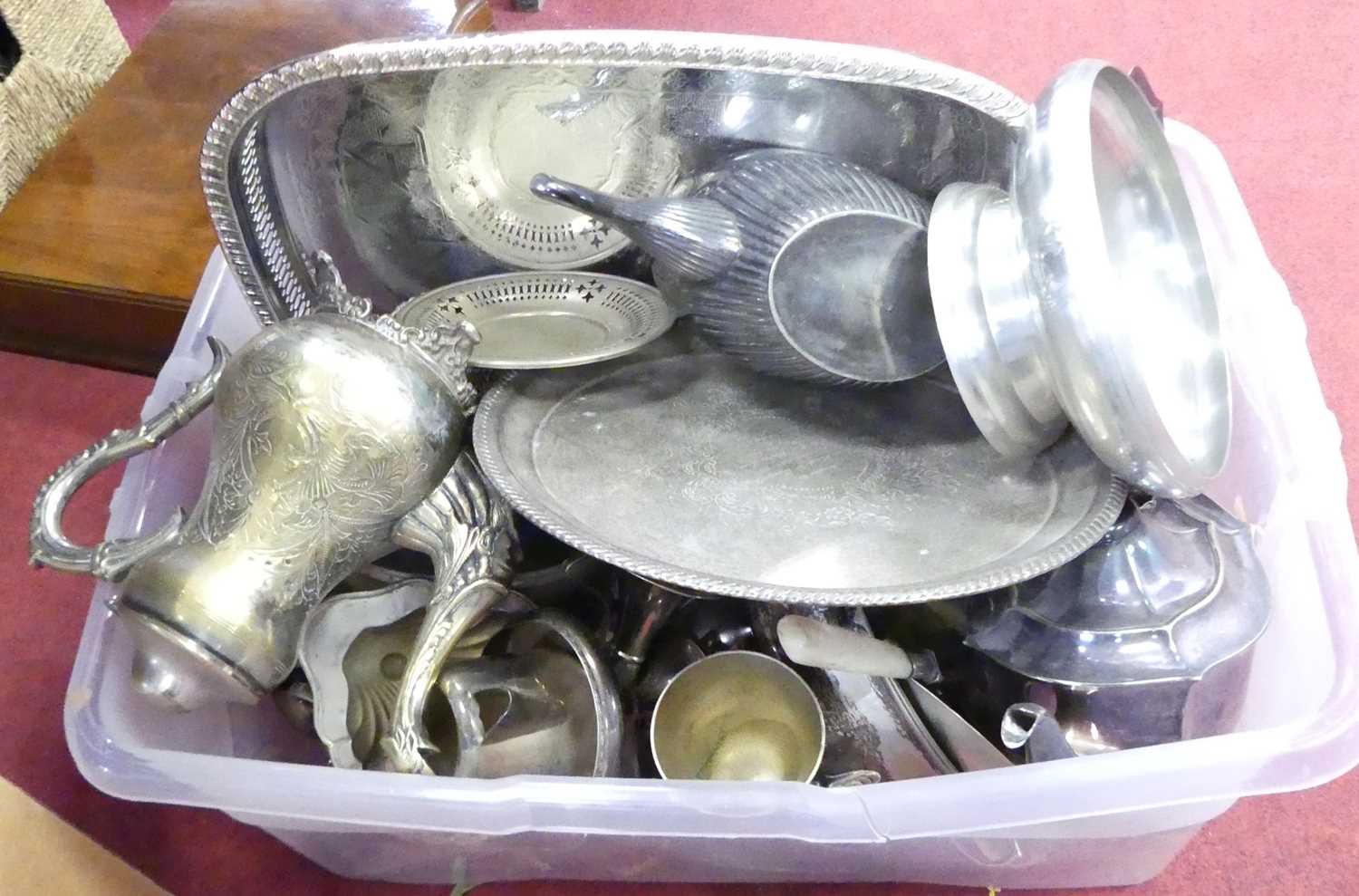 A collection of silver plated items to include tea pots, dishes, and pierced gallery tray (two