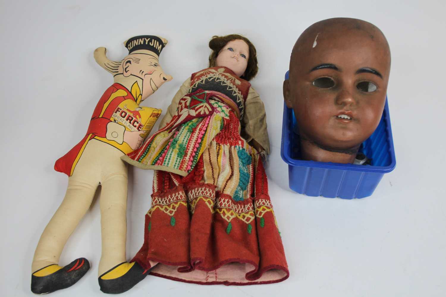 A Simon & Halbig German bisque dolls head, having four upper teeth (a/f) etc