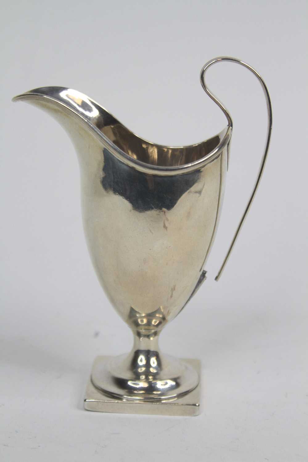 A George III silver cream jug, of helmet shape, Sheffield 1792, 4.3ozt